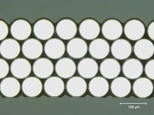 Querschnitt einer gewickelten Backlackspule (Hellgrau = Isolierung, Dunkelgrau = Backlackschicht) Bildquelle: Elektrisola